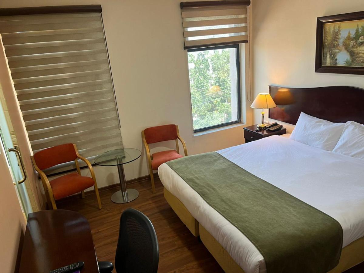 Rozana Hotel Амман Екстер'єр фото